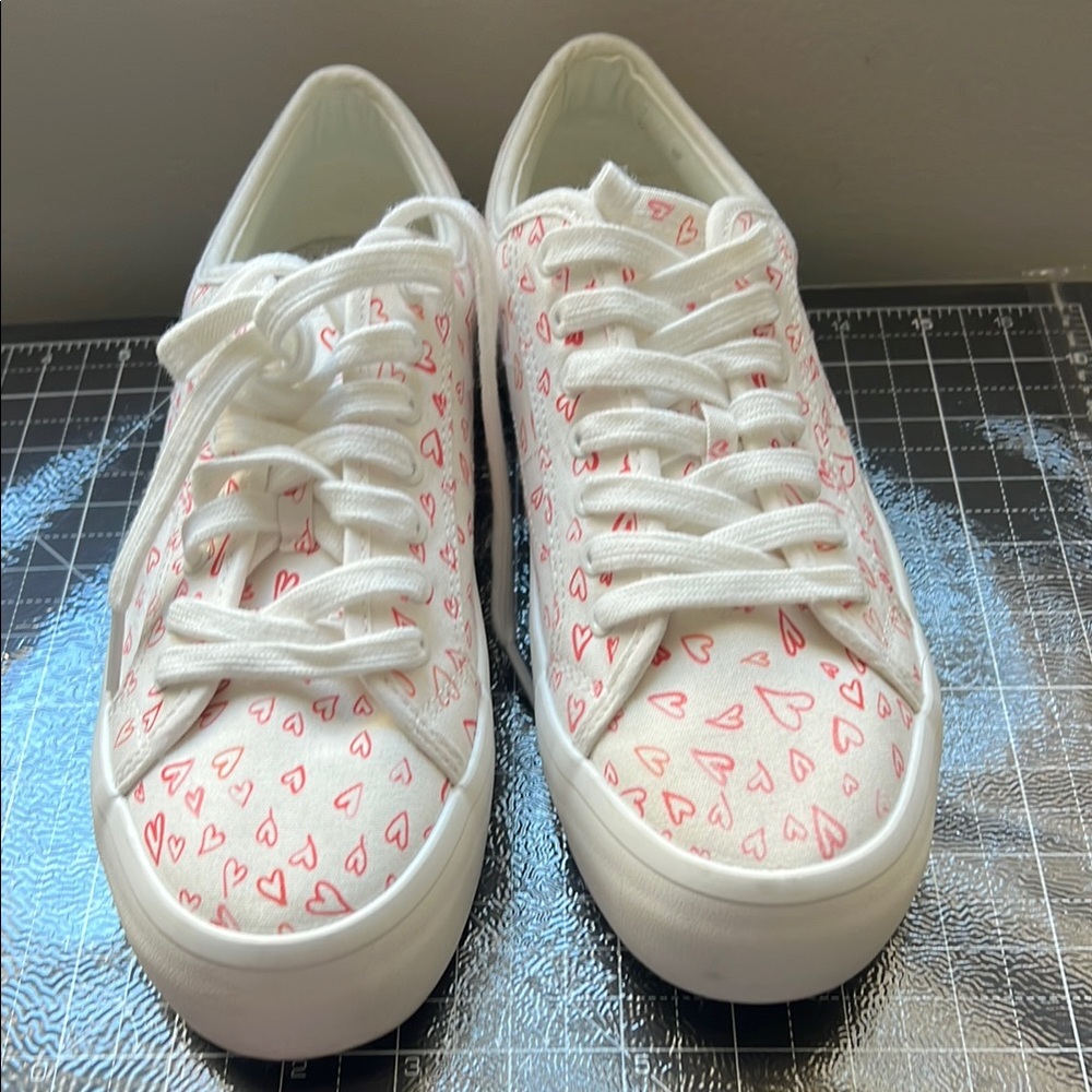 White Sneakers with Red Heart Pattern